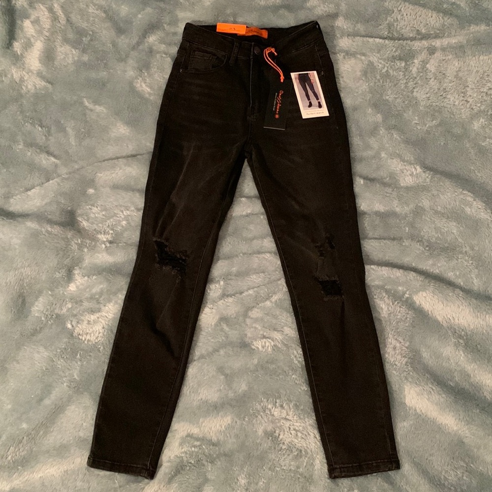 Black ripped skinny jeans in a size 3/26 from one53jeans